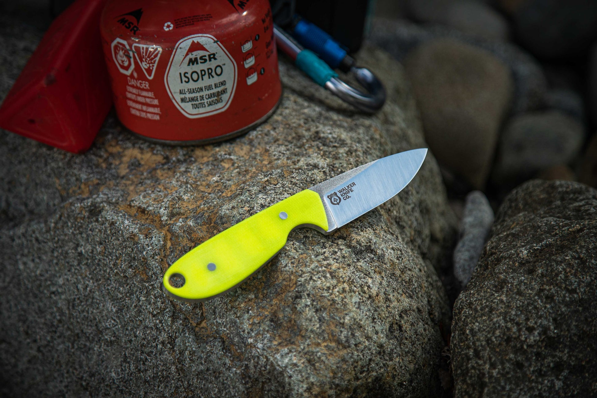 River Knife in stainless steel at campsite